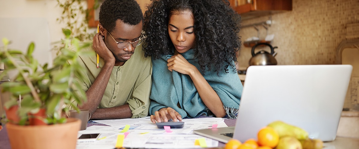 Family reviewing financial protection plan.