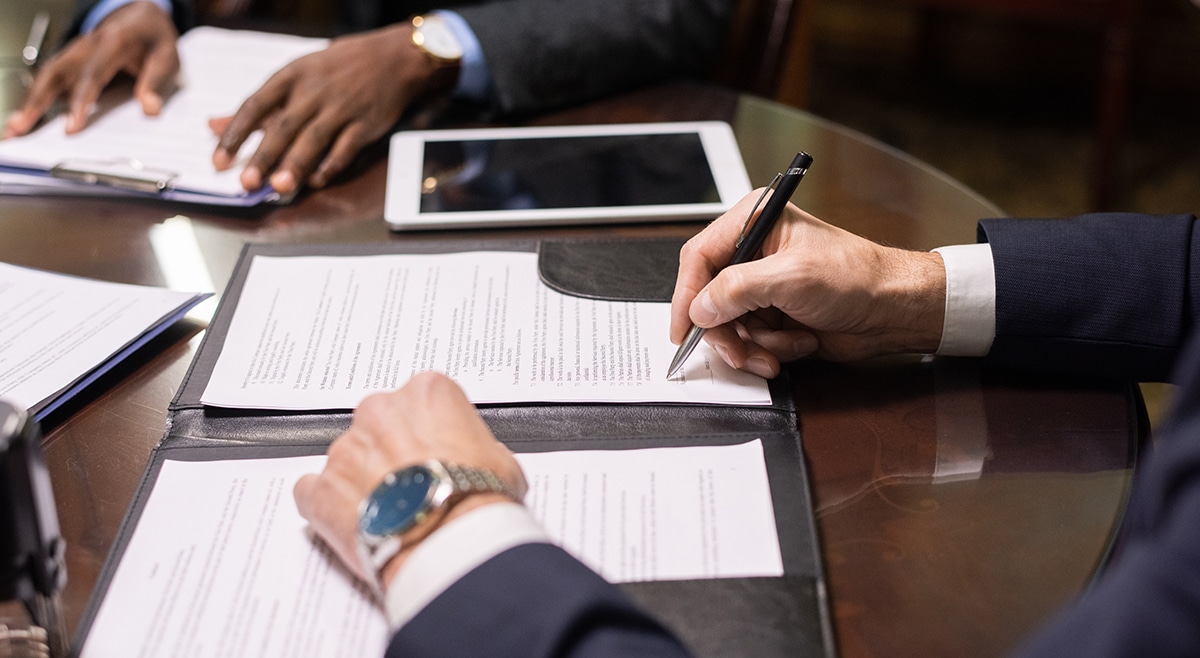 Business partners facing legal paperwork